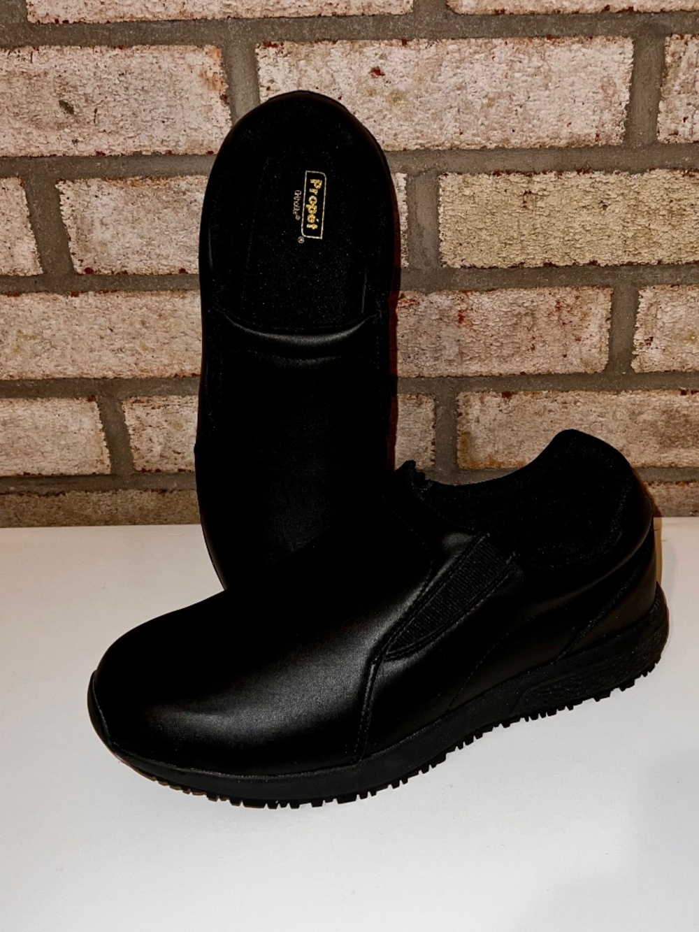 Propet men’s size 8 x3E extra wide black anti-slip, Ortholite slip-on shoes.